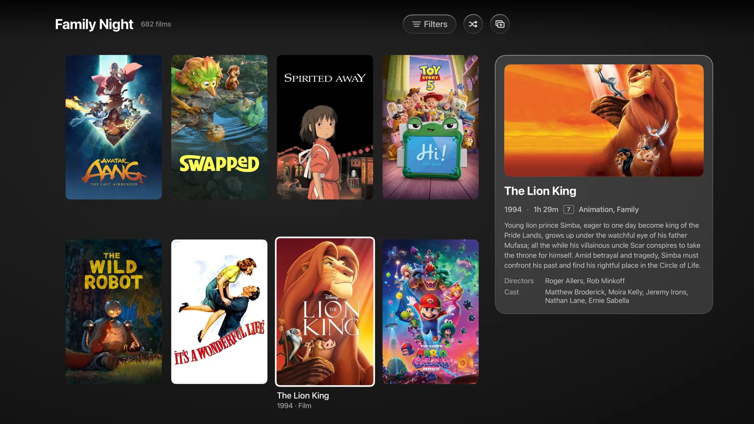 A family movie collection in Vyn with posters and title information.